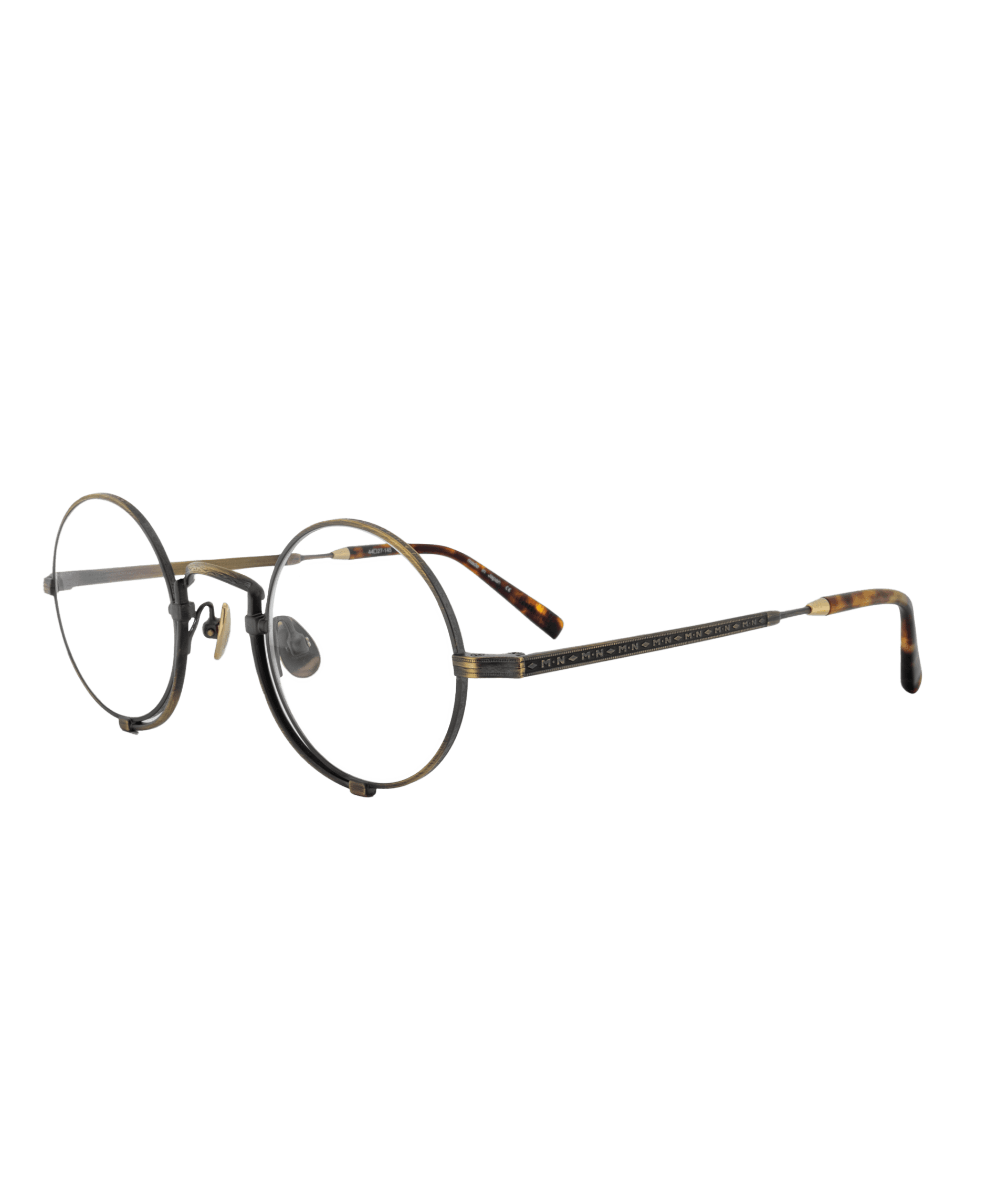 Inspirée par le style emblématique des lunettes pince-nez de la fin des années 1800, cette monture arbore une forme ronde et se distingue par la gravure signature M+N, élégamment apposée sur le fil de la monture et les branches.