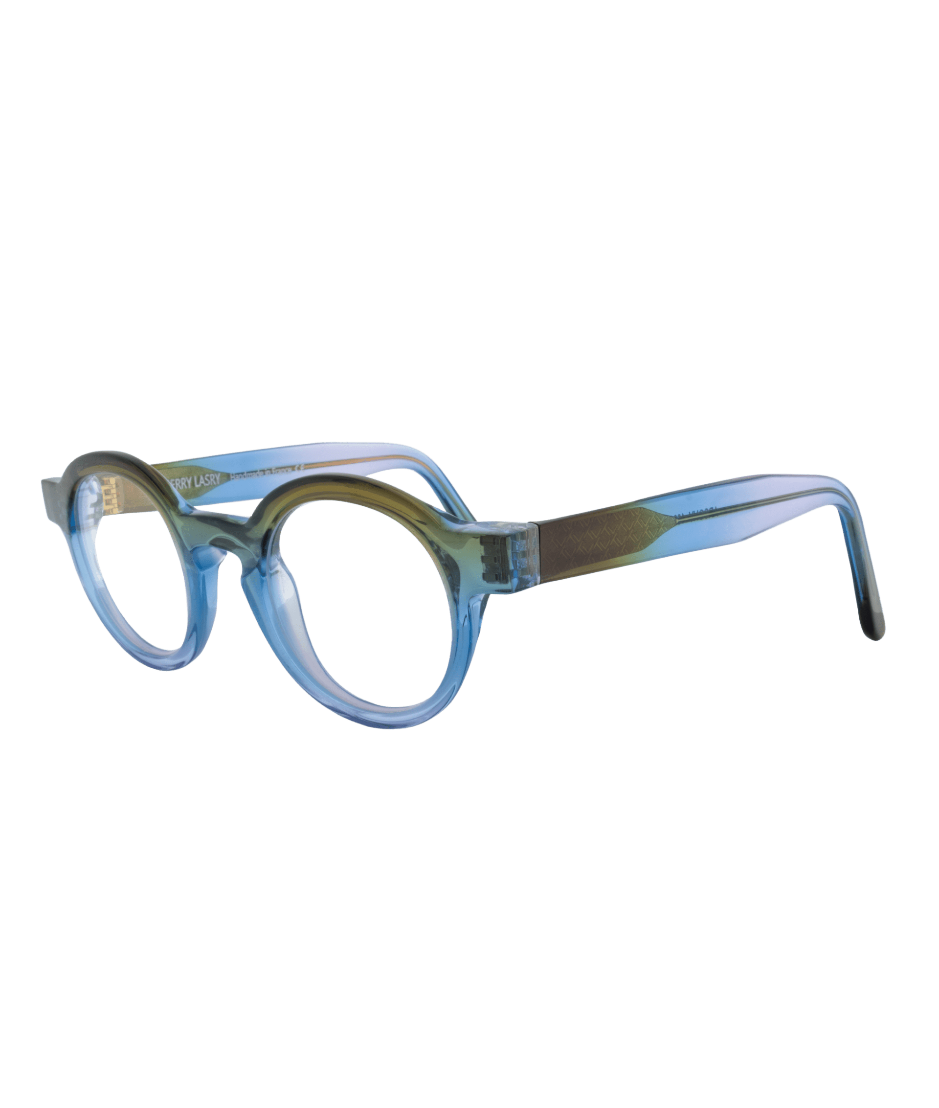 Handcrafted in France from premium Italian acetate, this elegant frame stands out with its unique round shape featuring squared ends, a finely sculpted bridge, and oversized lenses, combining sophistication and originality.