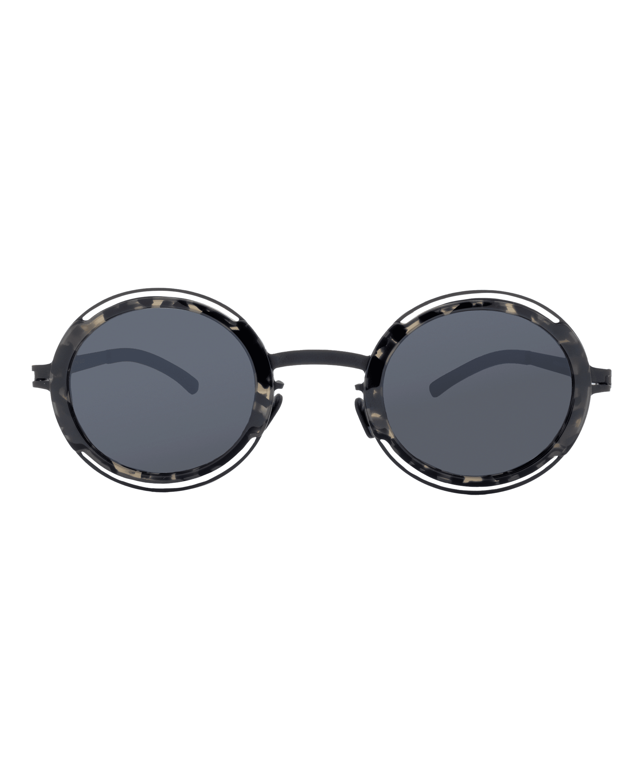 Round sunglasses with dark lenses and a black-and-white tortoiseshell patterned frame, shown against a plain white background. Discover these unique styles at Vu, home to le plus grand inventaire de montures à Montréal.