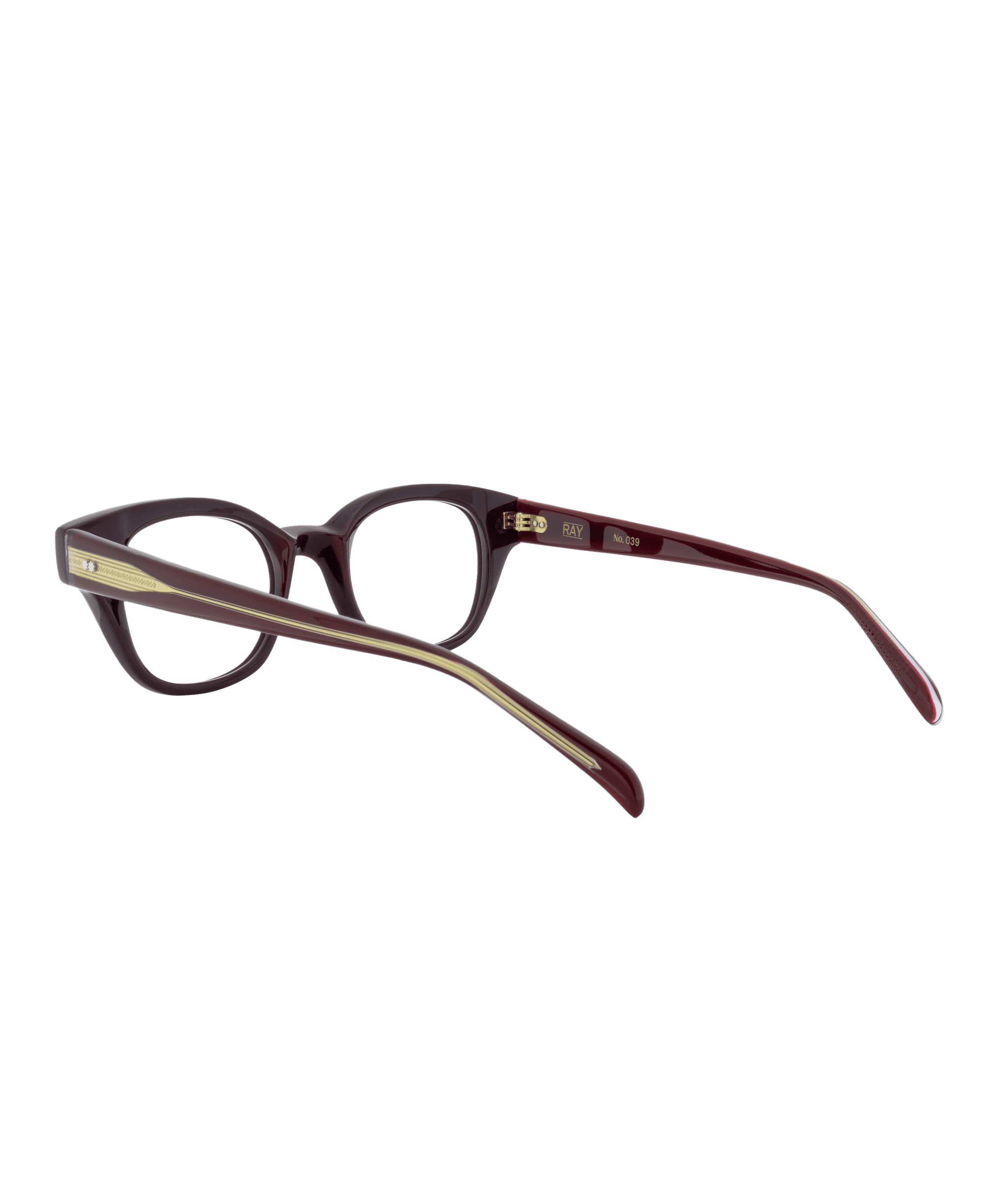 1154: Dark brown oval eyeglasses with wide arms, gold stripe detail, and Vu branding near the hinges—displayed on a white background, part of the largest frame inventory in Montréal.