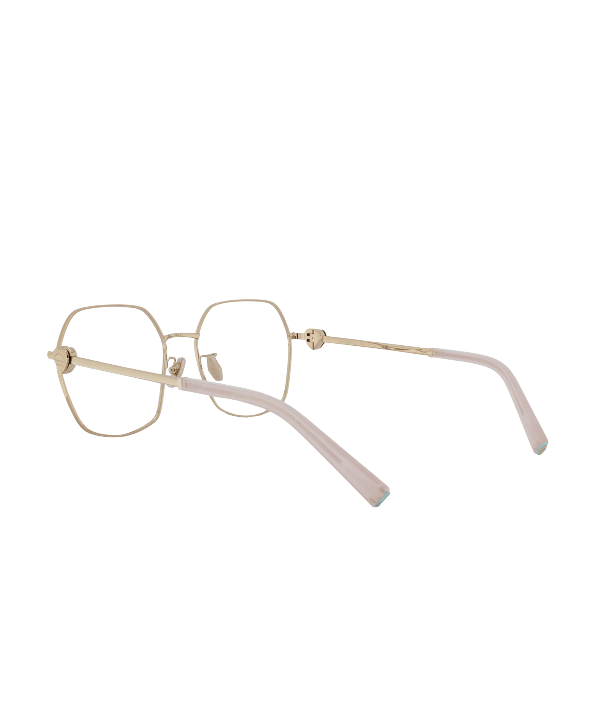 The 1165D features gold geometric hexagonal frames with translucent light pink temple arms from La lunetterie VU à Montréal, shown against a white background.