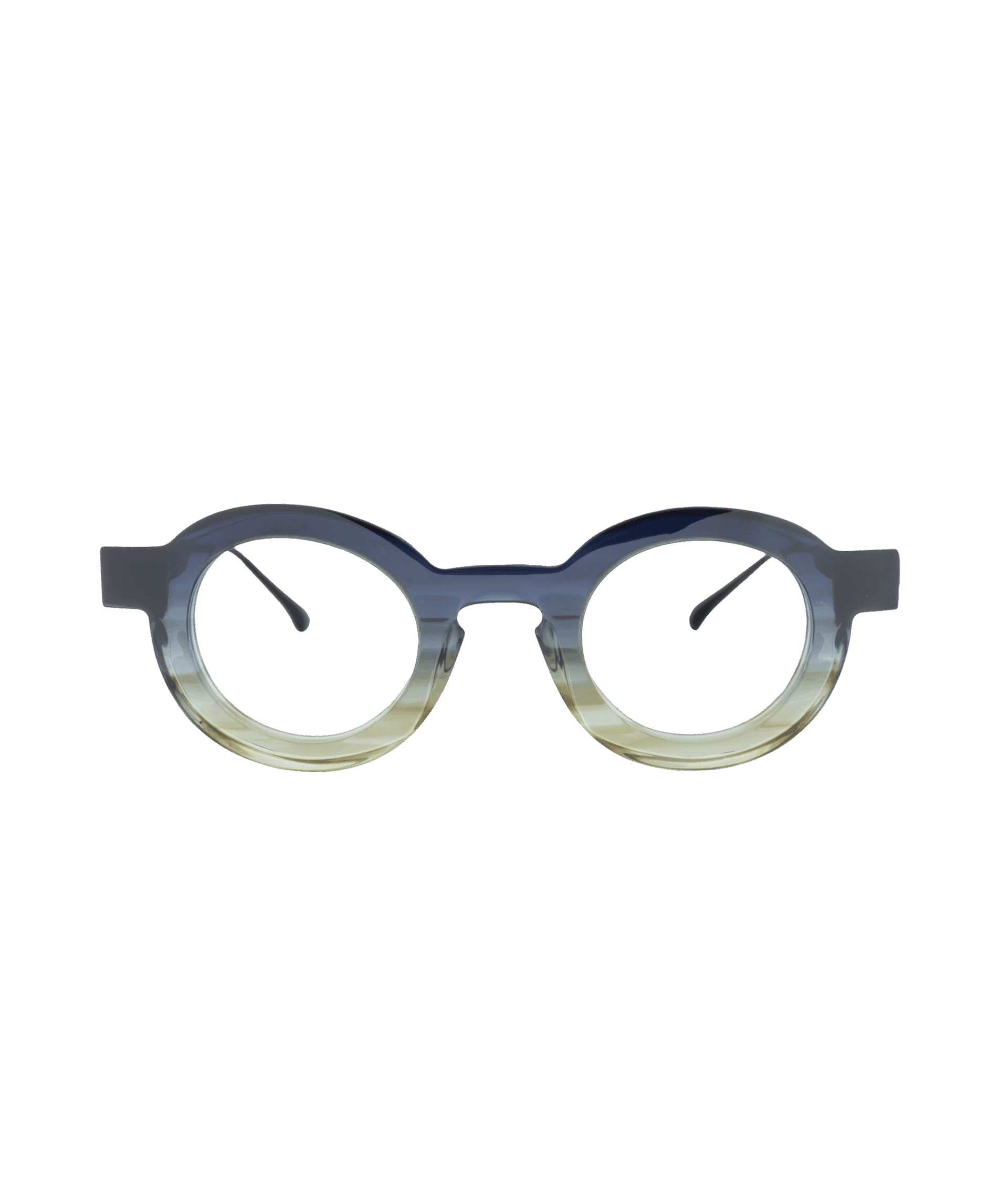 Les lunettes rondes NEURDI présentent une épaisse monture dégradée passant du bleu foncé sur le dessus au vert clair sur le dessous, sur un fond blanc uni. Disponibles à la lunetterie VU à Montréal.