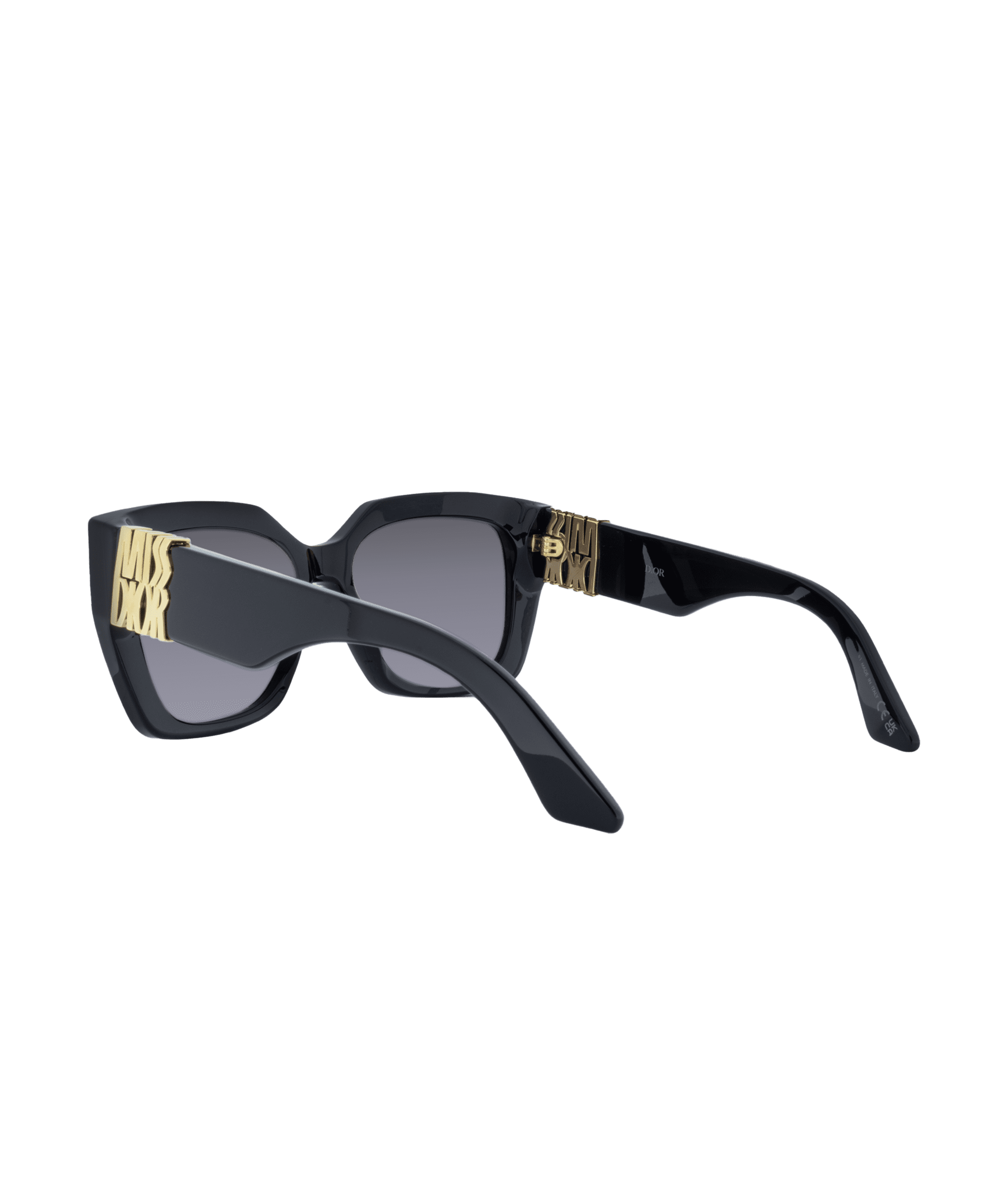 Black square sunglasses with thick frames, grey tinted lenses, and a gold MISS DIOR logo on the temples, available at La lunetterie VU à Montréal; displayed on a white background.
