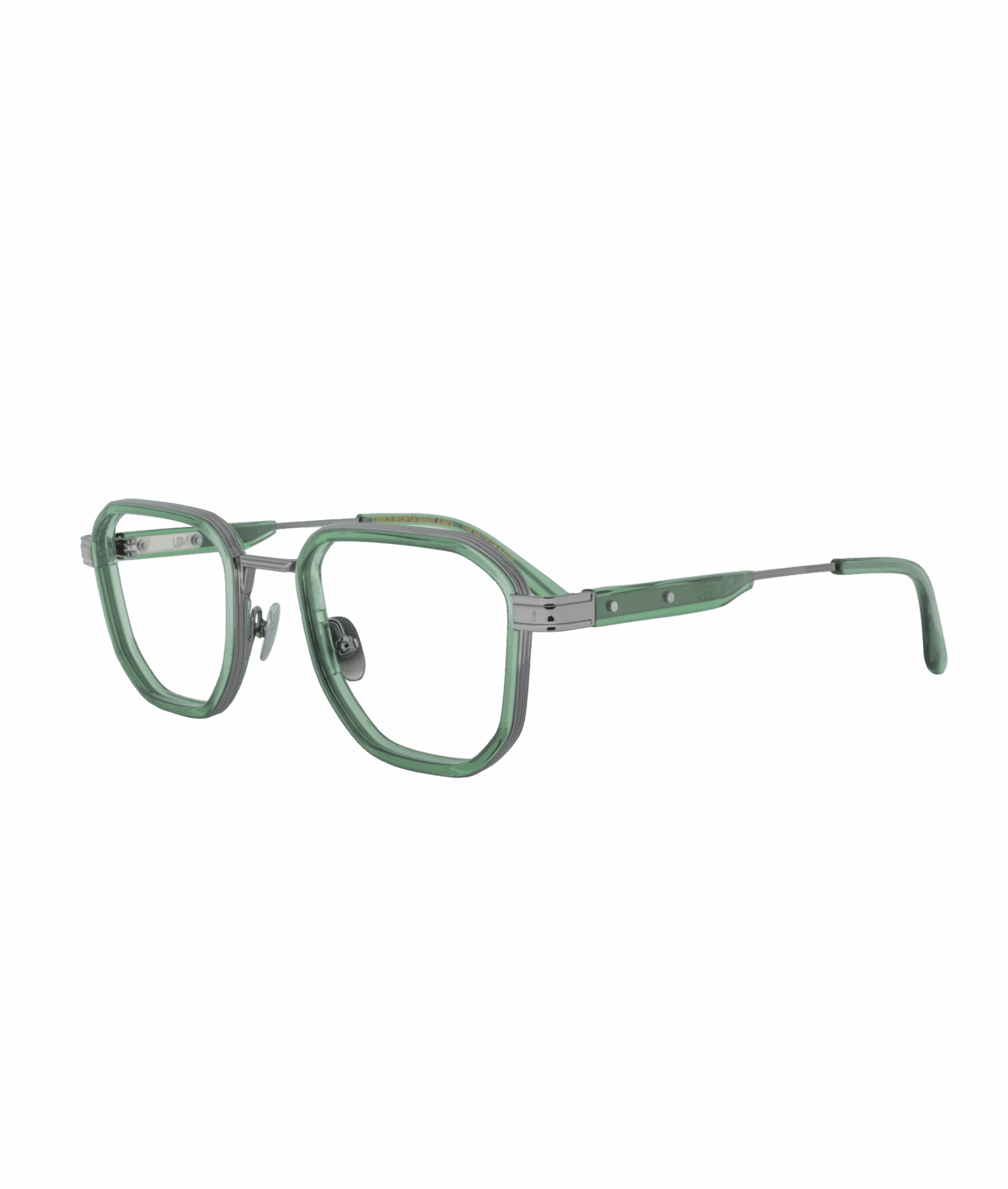 A rich, vibrant natural green, delicate yet striking. This full-metal frame elevates its square geometry with surprising lightness, blending structural finesse with bold character. A contemporary statement that combines visual strength with airy comfort.