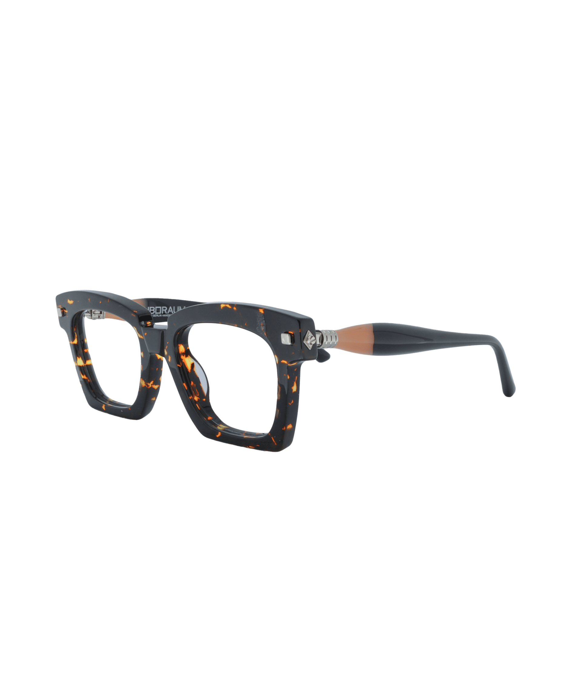 Handcrafted in Italy and designed in Berlin, this frame features a perfectly balanced square shape. Its near-black tortoise pattern, accented with orange flecks, evokes the glow of a living fire, creating a look that is both intense and uniquely striking.